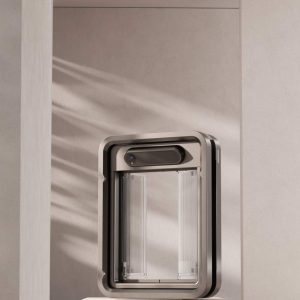 Smart Pet Door with Camera Displayed on Stone Surface in Bright Modern Home - Minimalist Interior Scene with Natural Light